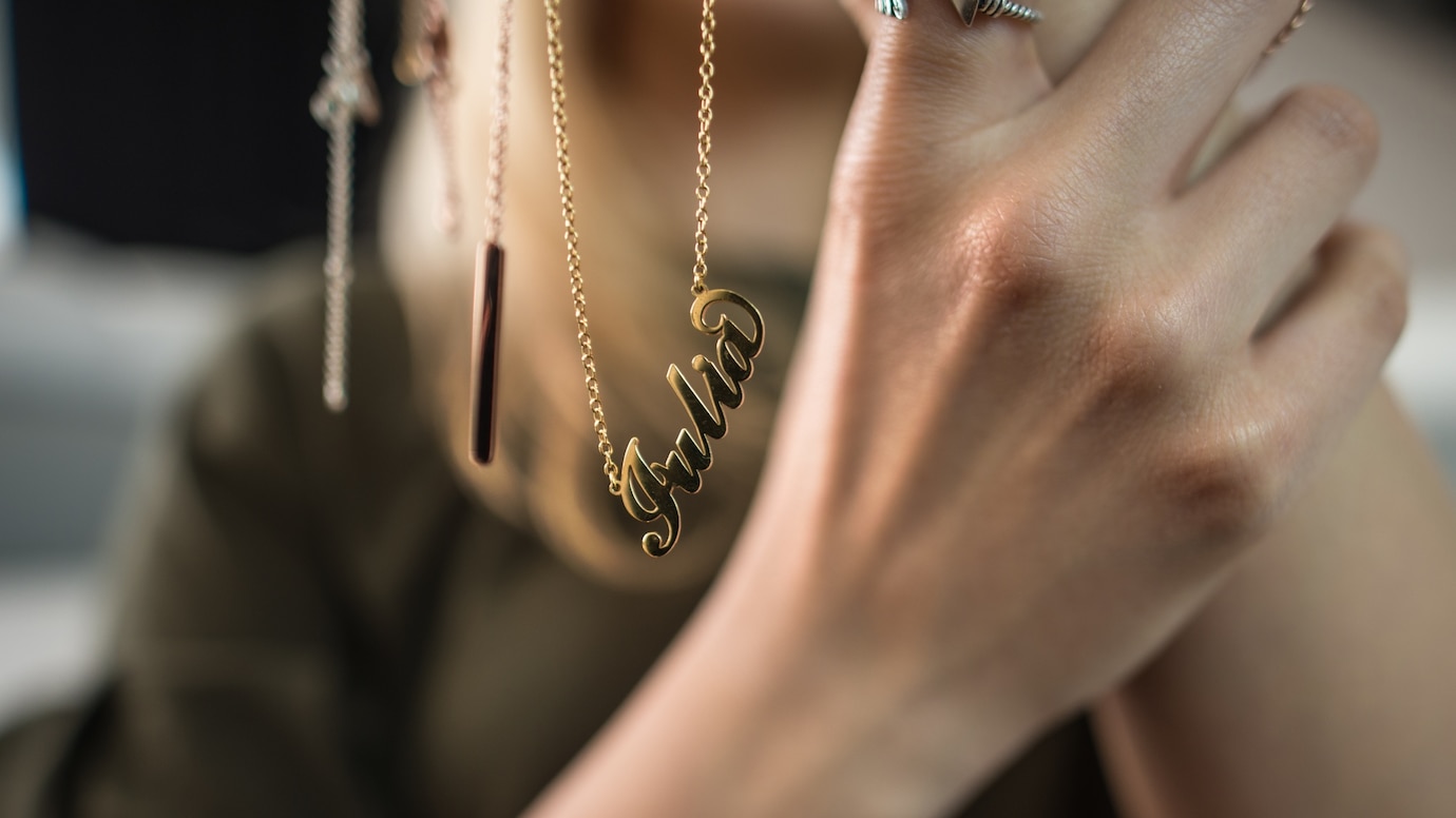 woman-showcasing-jewelry-her-hands_1400-22